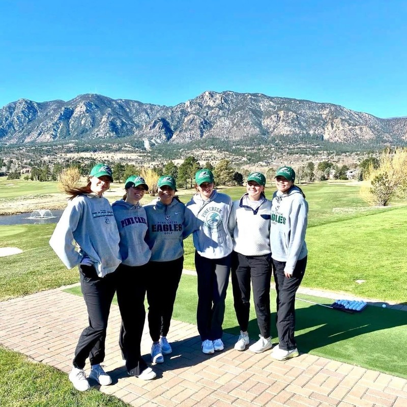 Girls in front of mountains